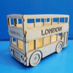 Laser Cut A bus-shaped pencil holder layout Free Vector